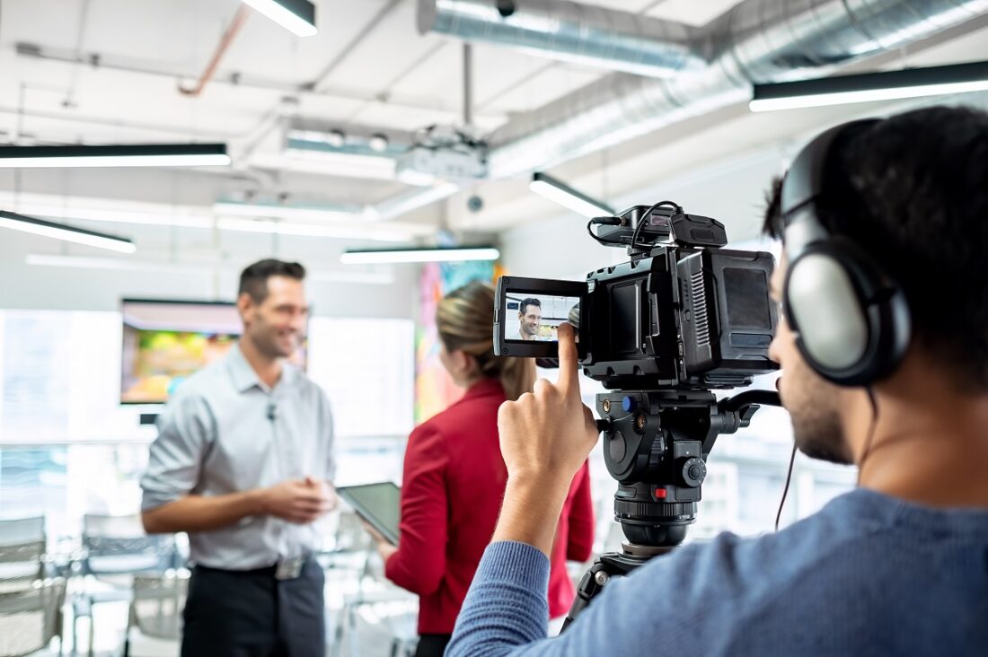 Happy,Businessman,During,Corporate,Interview,With,Female,Journalist.,Manager,Answering