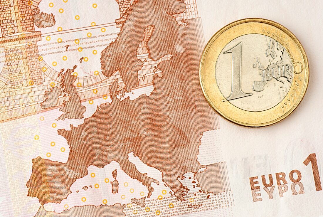 One,Euro,Coin,On,Euro,Banknote,Showing,Map,Of,Europe