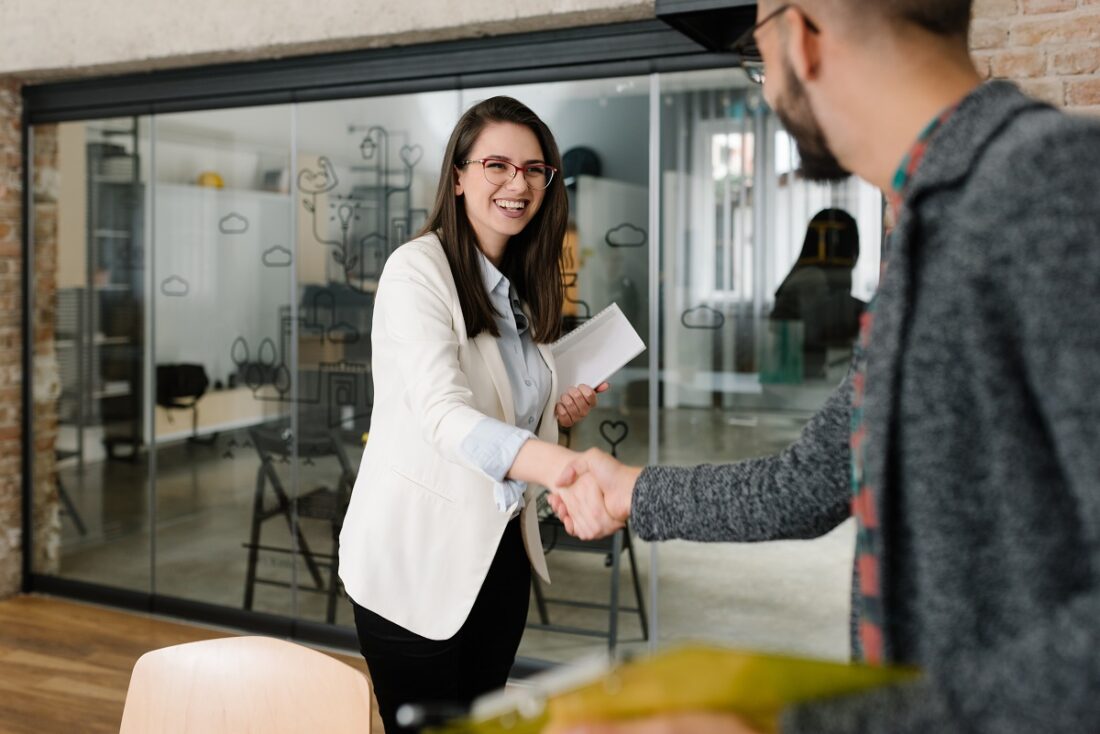 Openly,Greeting,A,Job,Recruiter,With,A,Firm,Handshake