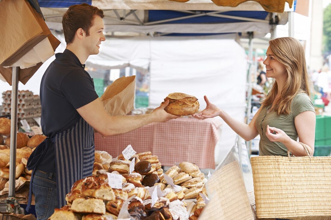 Customer,Buying,Loaf,From,Market,Bread,Stall