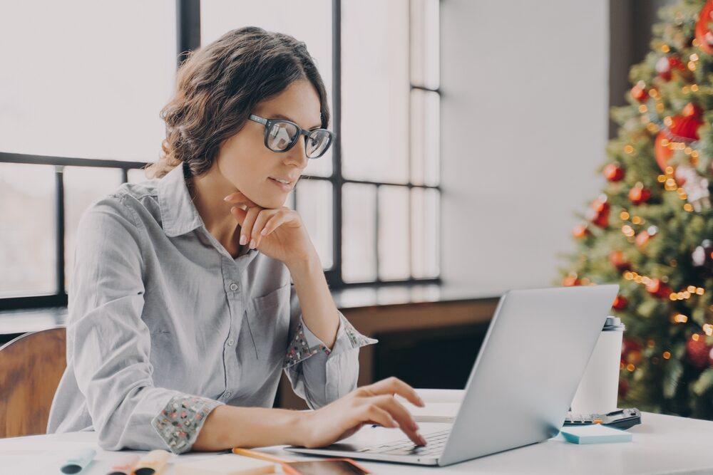 Concentrated,European,Business,Woman,In,Spectacles,Typing,On,Computer,Keyboard