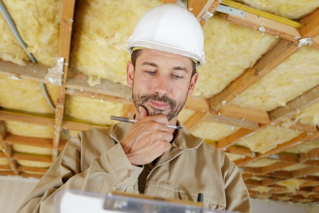 Male,Builder,Checking,His,Clipboard