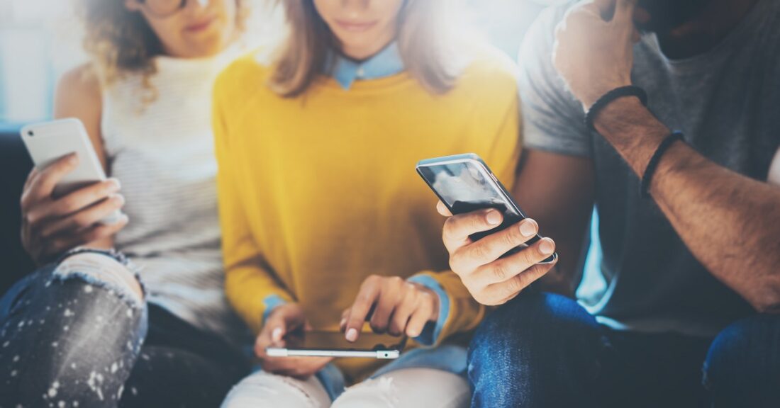 Closeup,Group,Adult,Hipsters,Friends,Sitting,Sofa,Using,Hands,Modern