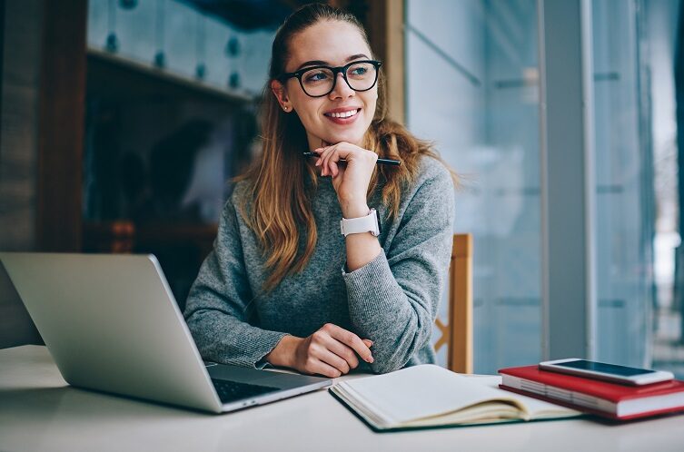 Happy,Successful,Female,Student,Enjoying,Study,Process,Indoors,Using,Laptop