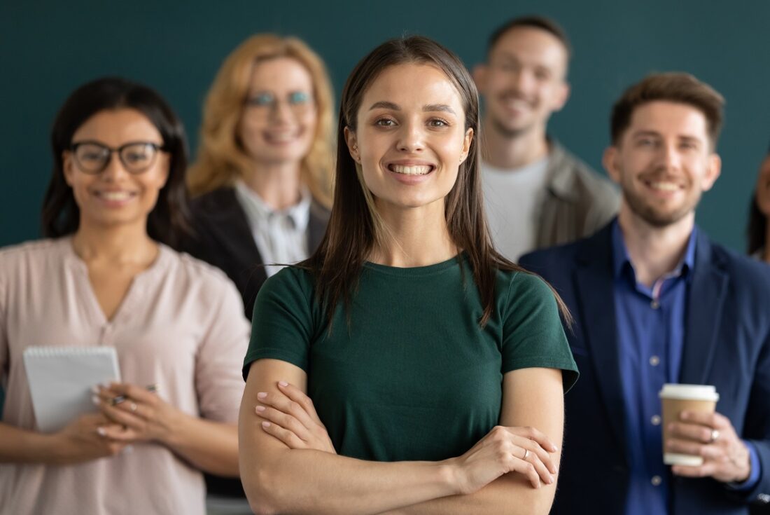 Close,Up,Headshot,Portrait,Of,Happy,Businesswoman,Hands,Crossed,Posture.