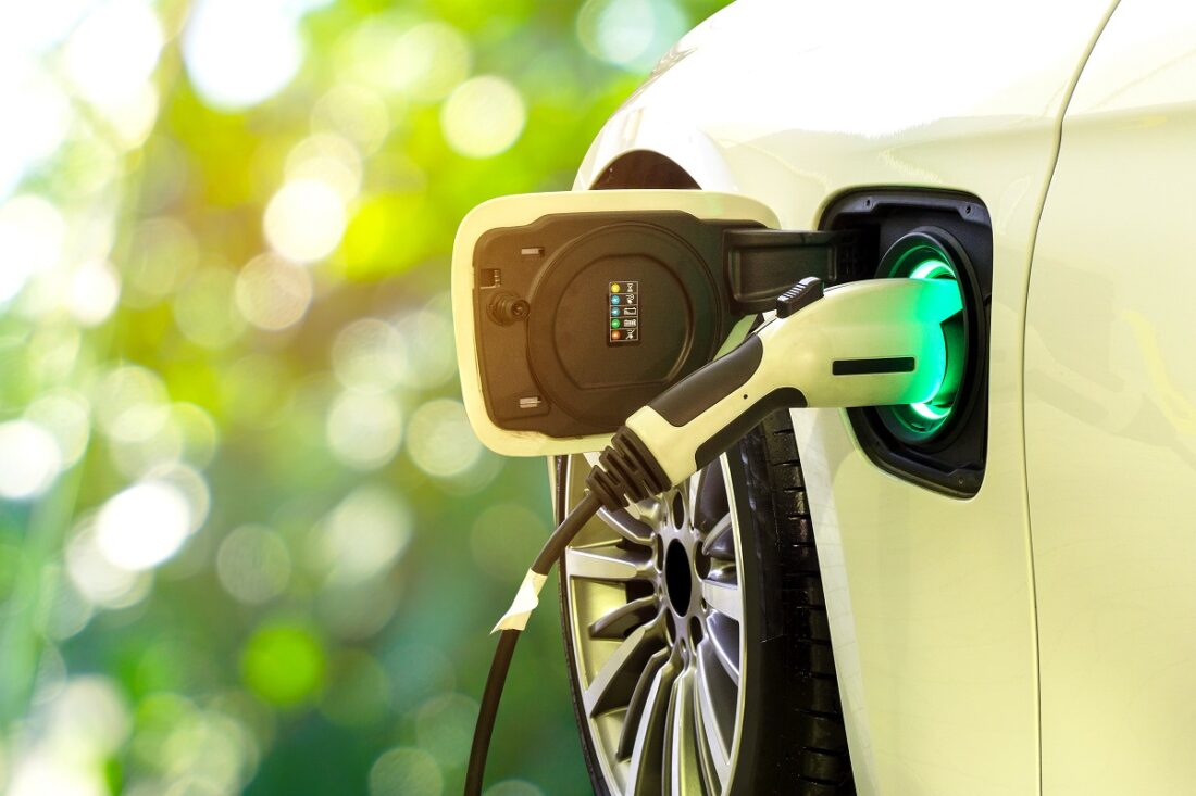 Ev,Car,Or,Electric,Car,At,Charging,Station,With,The