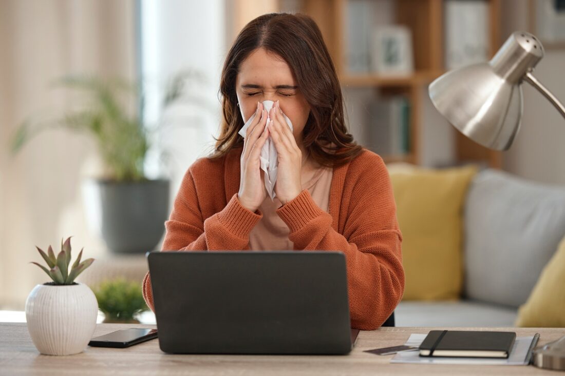 Woman,,Blowing,Nose,And,Student,With,Laptop,,Allergies,Or,Burnout