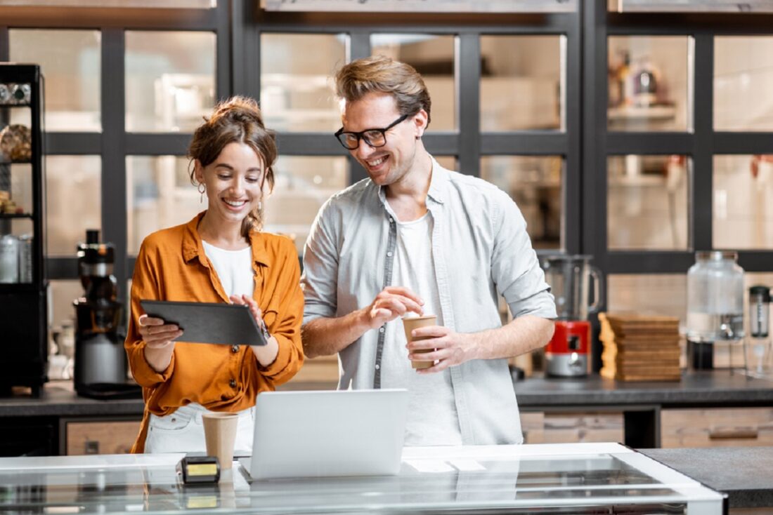 Two,Young,Managers,Or,Shop,Owners,Having,Some,Discussion,While