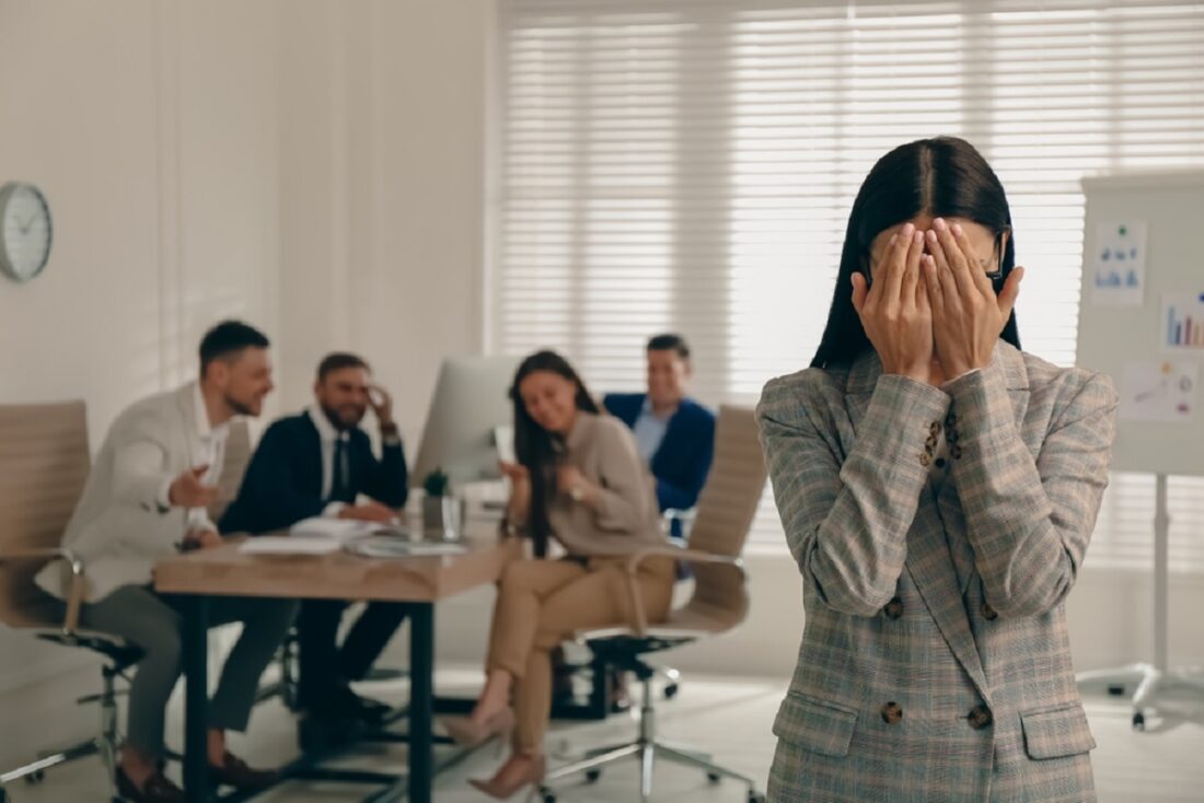 Woman,Suffering,From,Toxic,Environment,At,Work