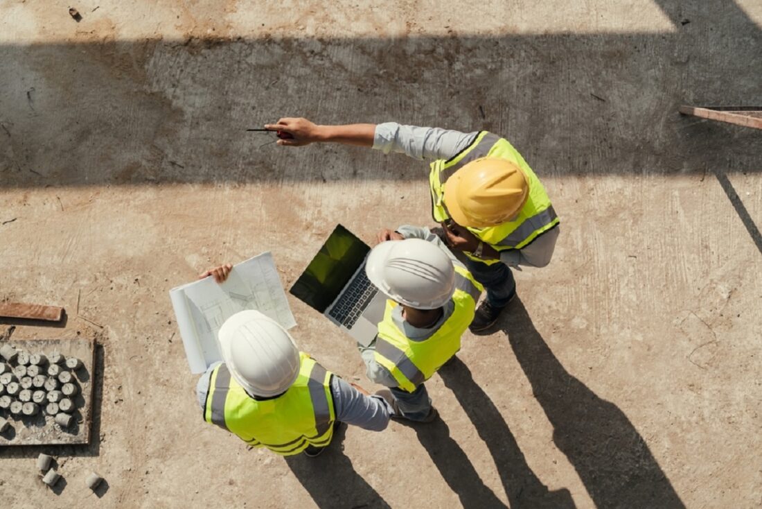 Top,View,,Team,Engineer,Building,Inspection,Use,Tablet,Computer,And